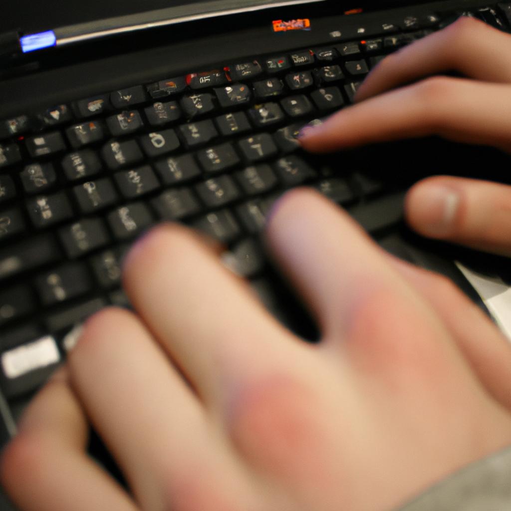 Person coding on a computer